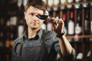 Bokal,Of,Red,Wine,On,Background,,Male,Sommelier,Appreciating,Drink